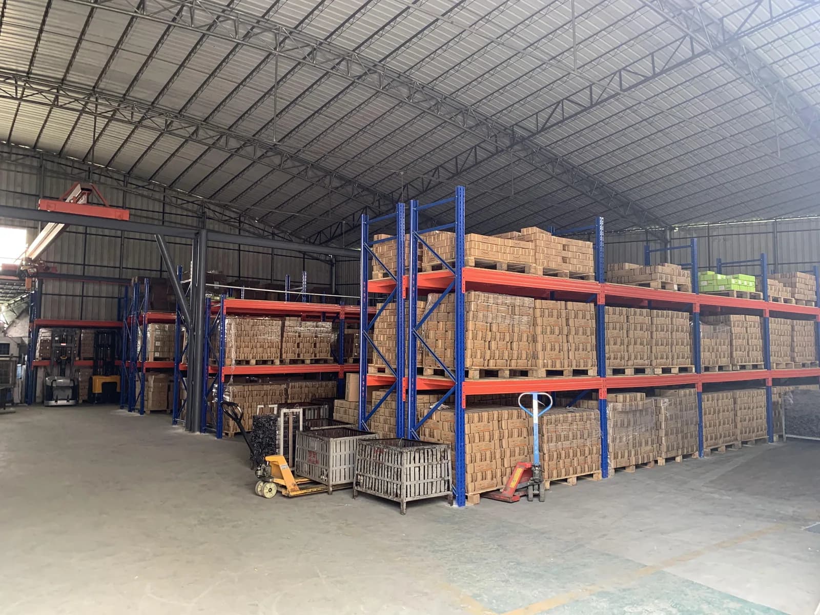 Shelved goods inside the WANYILONG factory warehouse