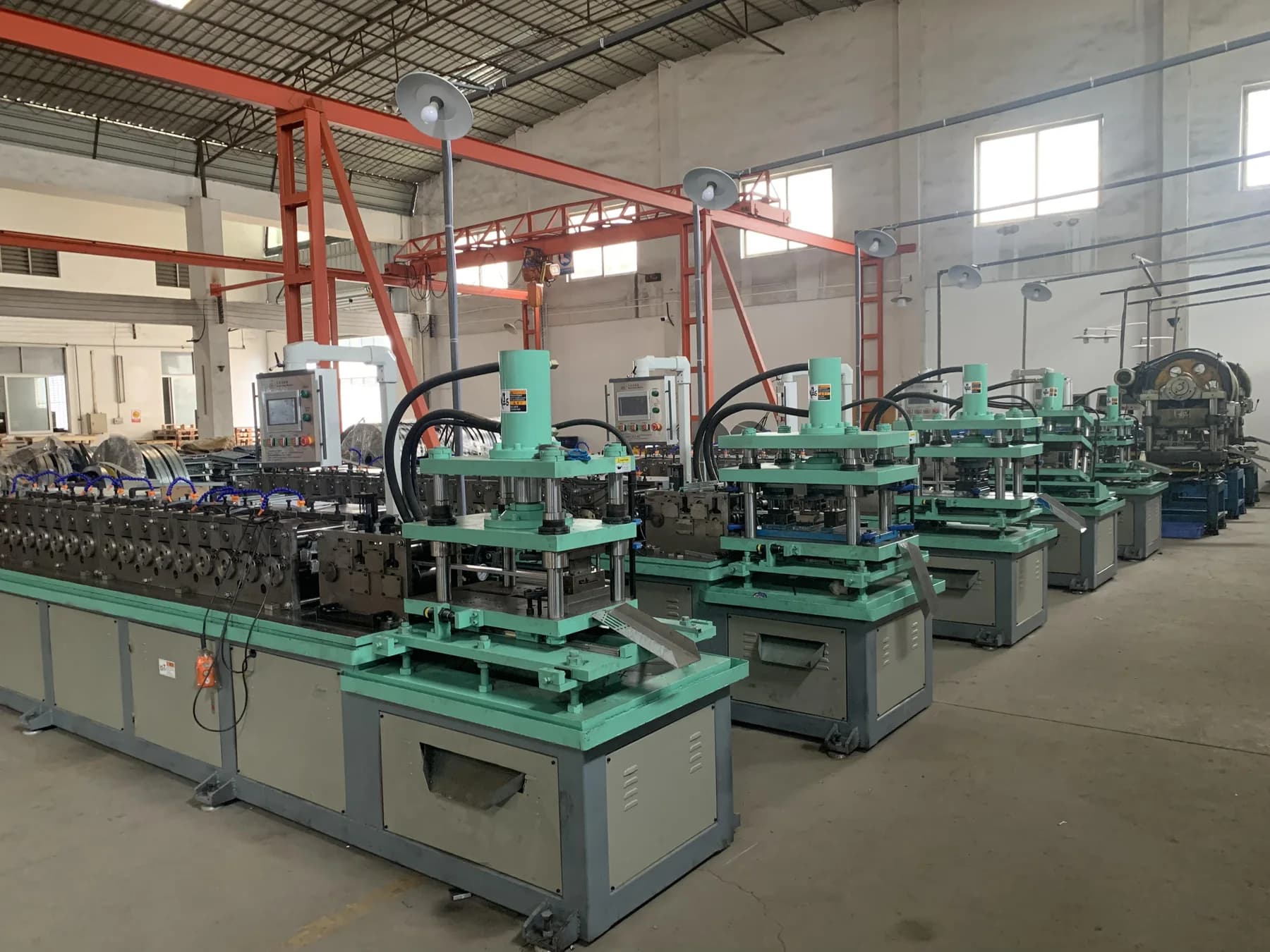 Row of production machines inside the WANYILONG workshop