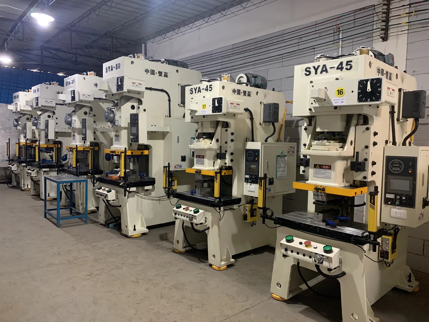 Metal stamping equipment inside the WANYILONG workshop